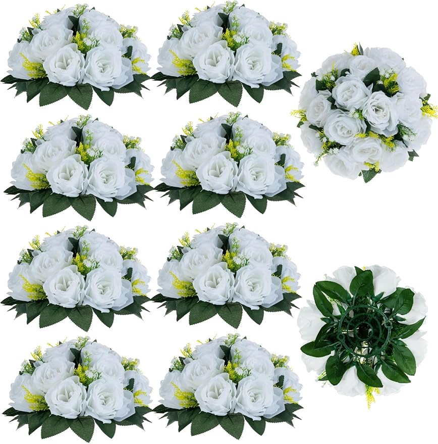 Set of white flower bouquets with green leaves on a white background